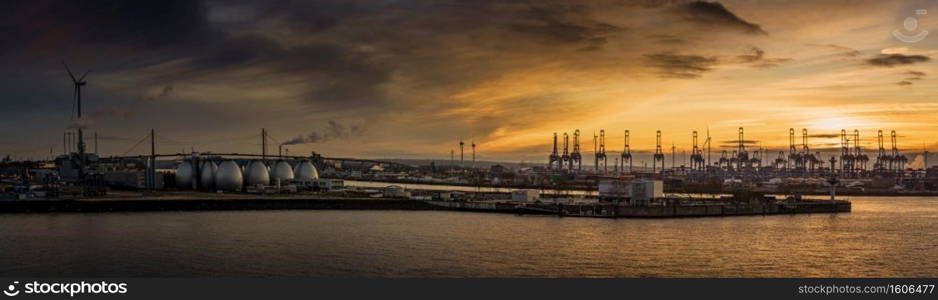 Panorama of the harbor of Hamburg  Suderelbe  with Kohlbrand bridge at sunset