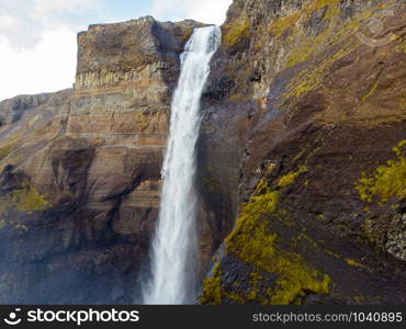 Panorama of the landscape of the Haifoss waterfall in Iceland. Nature and adventure concept background.