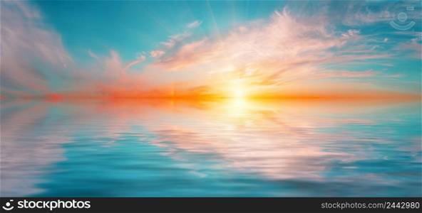 Panorama of the morning dramatic sky with bright sun above the water surface. Panorama of morning dramatic sky with bright sun above water surface
