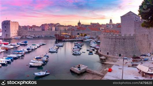 Panorama of the old medieval historical part of the city at sunset. Dubrovnik. Croatia.. Panoramic aerial view of Dubrovnik at sunset.