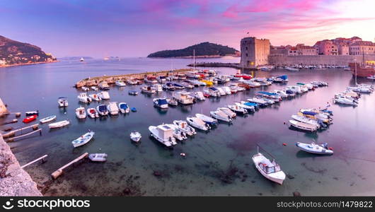 Panorama of the old medieval historical part of the city at sunset. Dubrovnik. Croatia.. Panoramic aerial view of Dubrovnik at sunset.