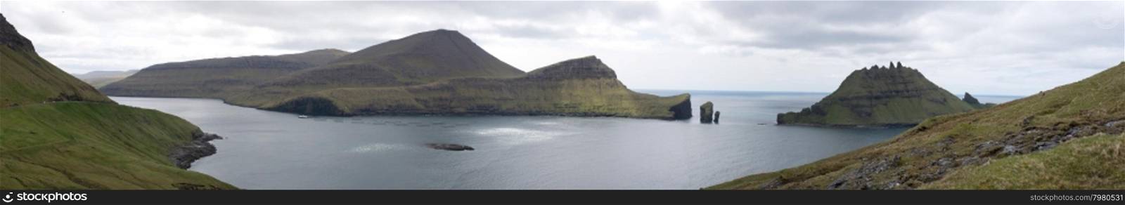 Panorama of Vagar and Tindholmur. Panorama of Vagar and Tindholmur on the Faroe Islands with salmon farm