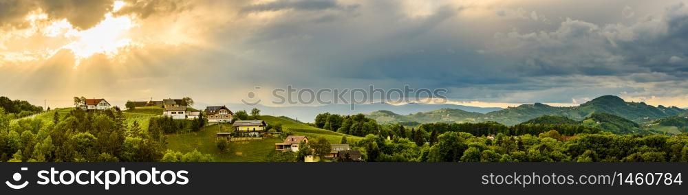Panorama of vineyards hills in south Styria, Austria. Tuscany like place to visit. Landscape during spring sunset.. Panorama of vineyards hills in south Styria, Austria. Tuscany like place to visit.