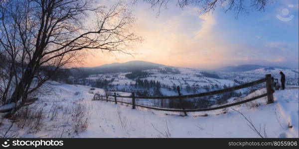 Panorama of winter mountains sunrise