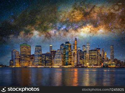 Panorama scene of New York Cityscape beside the east river at the night time over the milky way on the dark sky background, USA downtown skyline, Architecture and building, Surreal picture concept