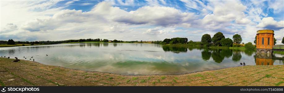 Panorama scene of sywell country park lake in Norhampton, England.