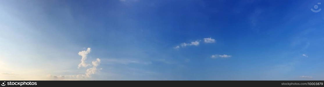 Panorama sky with beautiful cloud on a sunny day. Panoramic high resolution image.. Panorama sky with beautiful cloud on a sunny day. 