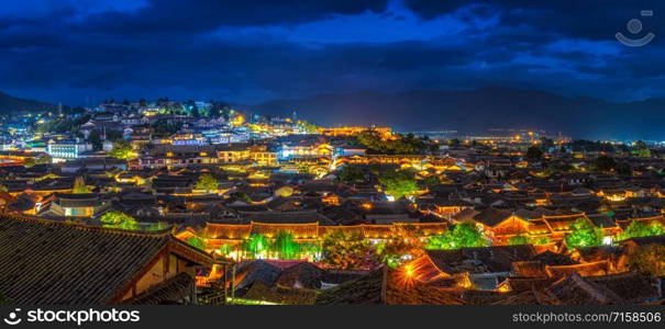 Panorama Top view scene of ancient LiJiang old town at twilight time, is the historical center of Lijiang City, in Yunnan, China.It is a UNESCO World,culture and traditional,travel and tourist concept