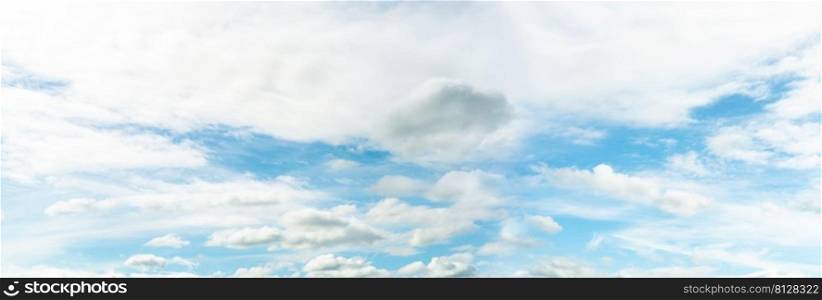 Panorama view of blue sky and white clouds abstract background. Cloudscape background. Blue sky and fluffy white clouds on sunny day. Nature weather. Beautiful blue sky for happy day background. 