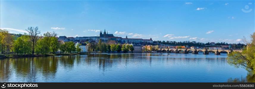 Panorama view of Charles bridge over Vltava river and Gradchany (Prague Castle) and St. Vitus Cathedral in the Prague, Czech Republic