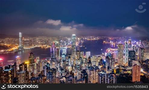 Panorama view of Hong Kong skyline on the evening seen from Victoria peak, Hong Kong, China.. Panorama view of Hong Kong skyline on the evening seen from Victoria peak.