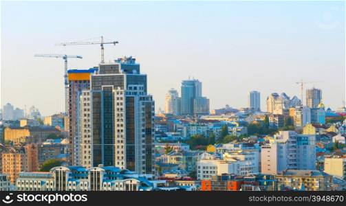 Panorama view of Kiev with construction sites of modern buildings. Ukraine
