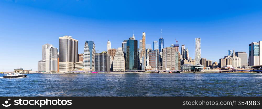 Panorama view of New York city Lower Manhattan skyscraper skyline building cityscape from Brooklyn New York State USA.