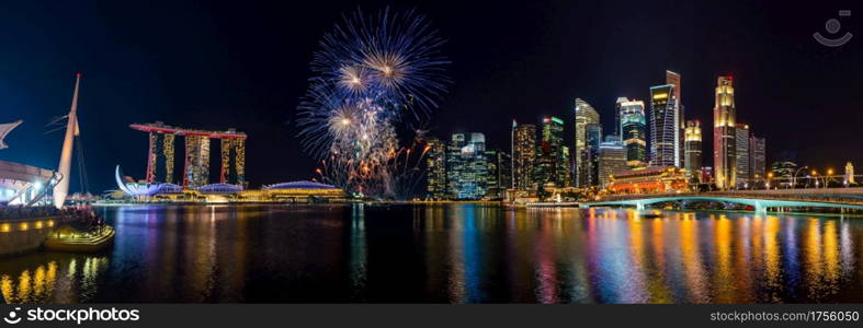 Panorama view of Singapore city skyline and Beautiful fireworks in Marina Bay