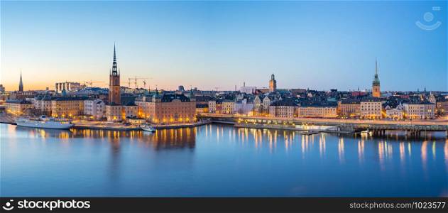 Panorama view of Stockholm Gamla Stan skyline at night in Stockholm city, Sweden.