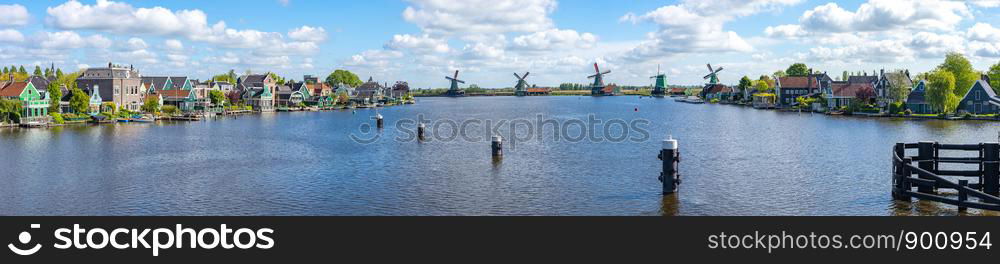 Panorama view of Windmills at Zaanse Schans and Zaandijk town in Netherlands.
