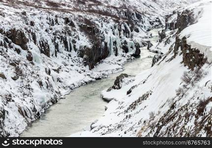 Panorama Winter landscape, river and cliff at northern Iceland