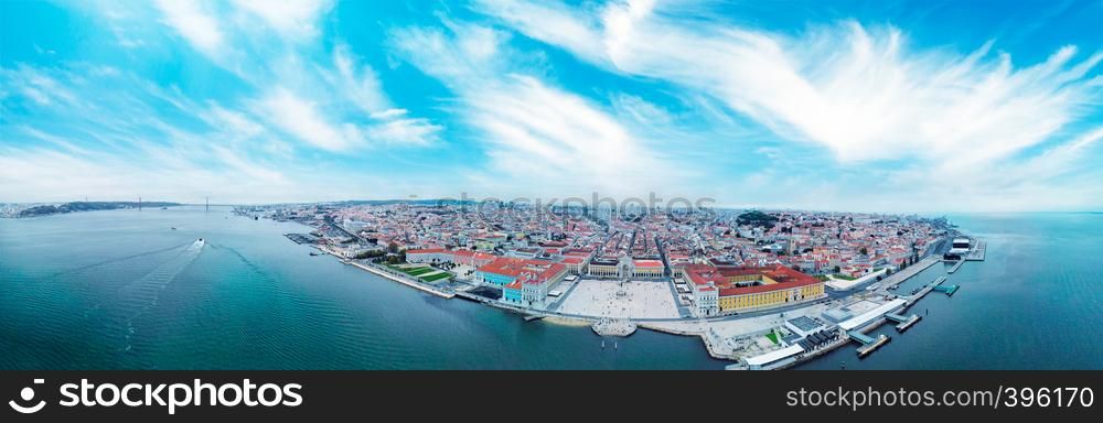 Panoramic aerial view of Lisbon skyline and Commerce Square at dusk, Portugal.