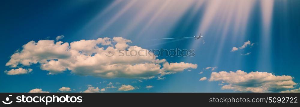Panoramic, Blue summer skies with white clouds and flying jet