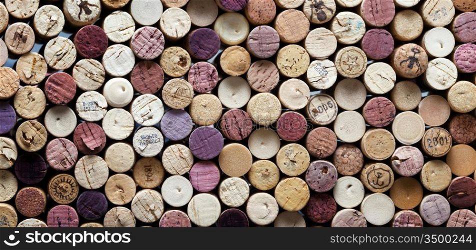 panoramic close-up of different wine corks. digital composite