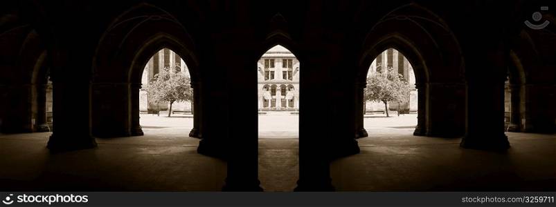 Panoramic composition of University of Glasgow architecture.