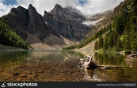 Panoramic image of Lake Agnes, a quiet place surrounded by the Rocky Mountains close to Lake Louise, Banff National Park, Alberta, Canada