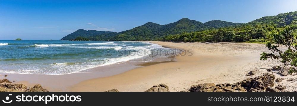 Panoramic image of Praia Branca  White Beach  located in the city of Bertioga and surrounded by rainforest on the coast of Sao Paulo, Brazil. Panoramic image of White Beach located in the city of Bertioga