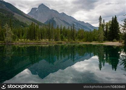 Panoramic image of the Chancellor Peak reflecting in the Feeder Lake, Yoho National Park, British Columbia, Canada