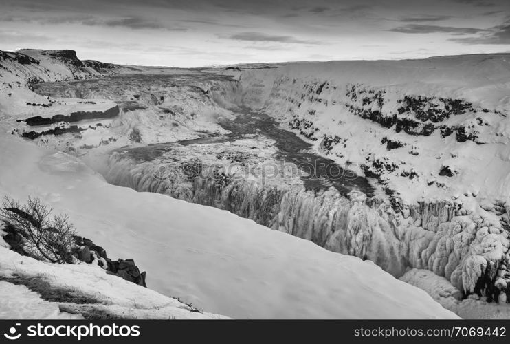 Panoramic image of the frozen waterfall Gullfoss, Iceland, Europe