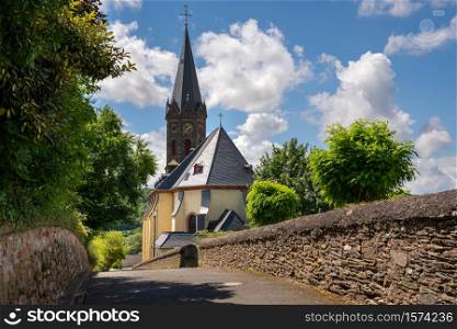 Panoramic image of the old Parish Church of Lieser close to Bernkastel on a sunny day, Moselle, Germany
