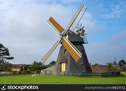 Panoramic image of the windmill of Nebel against blue sky, Amrum, Germany