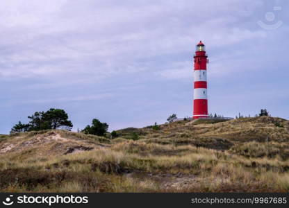 Panoramic image of the Wittduen lighthouse at sunset, Amrum, Germany