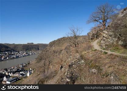 Panoramic landscape with hiking trail and the village Alken, Moselle, Germany