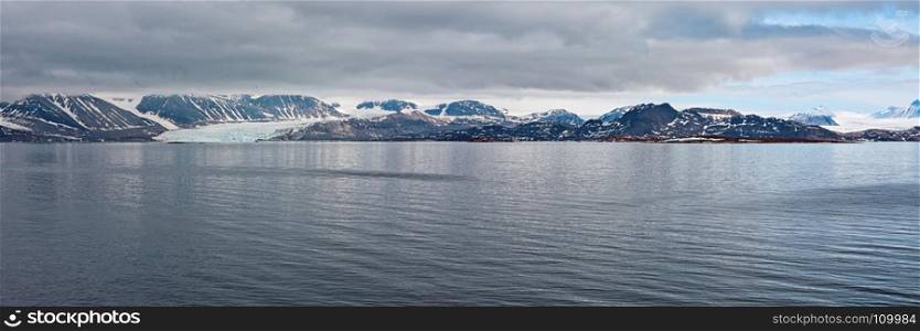 Panoramic mountain range and glacier in Svalbard islands, Norway. Mountain range and glacier in Svalbard islands