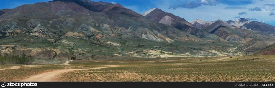 Panoramic picture of colored mountains near Mongolian Altai mountains, Russia.. Different colored mountains