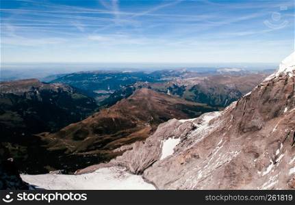 Panoramic scenery of Swiss alps mountain rage deep valley view from Jungfraujoch top of Europe, Switzerland