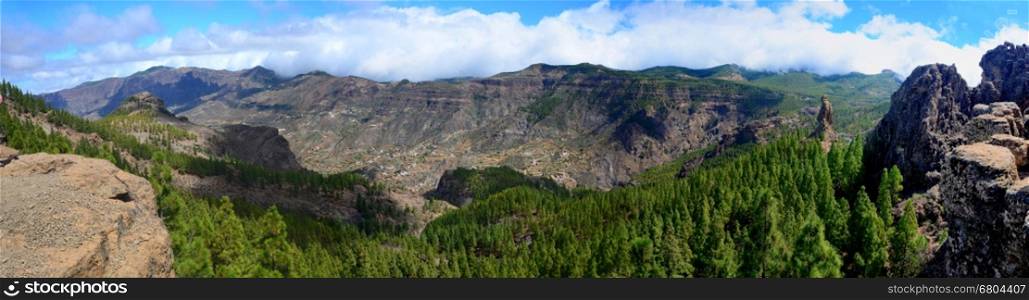Panoramic shot of Gran Canaria mountains, view from Roque Nublo peak.