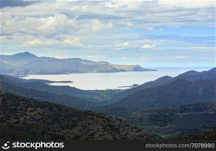 Panoramic summer view of Cadaques bay (Spain) from mountain pass.
