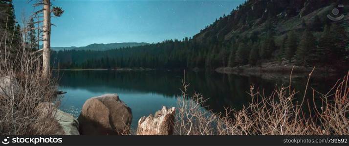 panoramic summer view of Twin Lakes at night in Mammoth Lakes California,