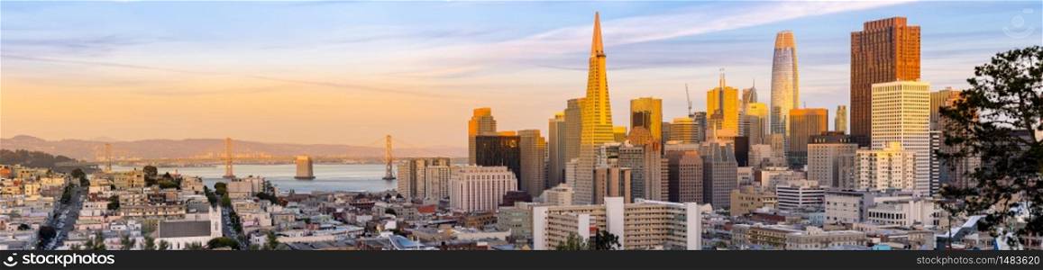 Panoramic Sunset at San Francisco downtown cityscape skylines ans skyscrapers building in California, USA. San Francisco United States Landmark Travel Destination cityscape urban and tourism concept.