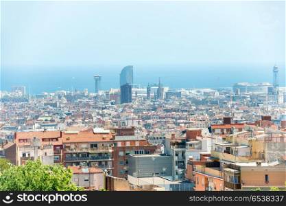 Panoramic view city of Barcelona, cityscape with buildings and blue sea. Panoramic view of city of Barcelona