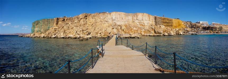 Panoramic view from the bridge to the ruined beach in the city of Sharm El Sheikh.