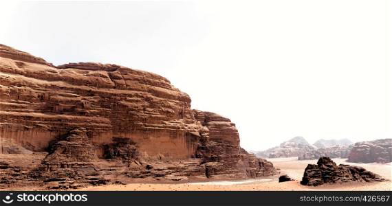 Panoramic view from the mighty rocky landscape in the desert of Wadi Rum, Jordan, middle east