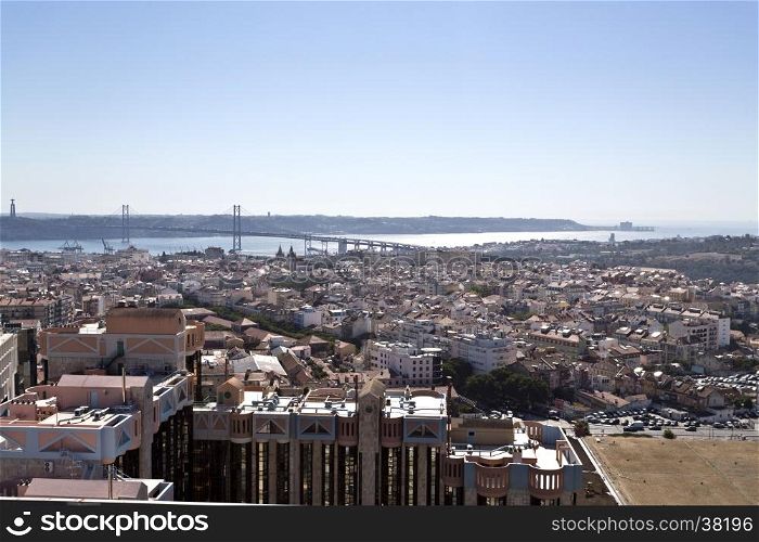 Panoramic view from the newest Amoreiras Lookout Point in Lisbon, Portugal, towards the Tagus River with the 25th of April Bridge in the background