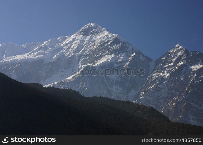 Panoramic view of a mountain range covered with snow, Annapurna Range, Himalayas, Nepal