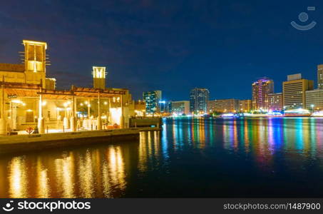 Panoramic view of Al Seef district and Deira on the other side of Creek in Dubai at night, United Arab Emirates