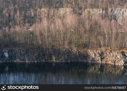 Panoramic view of an old open opencast mine of limestone works in Wuelfrath, Germany on a winter day.