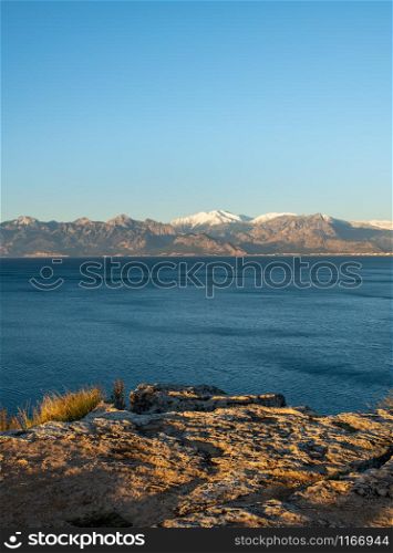 Panoramic view of Antalya on a sunny winter day with sea and snowy mountains. Antalya Panoramic View