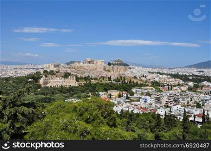 Panoramic view of Athens Greece city buildings and ancient landmarks Acropolis and Odeon of Herodes Atticus.