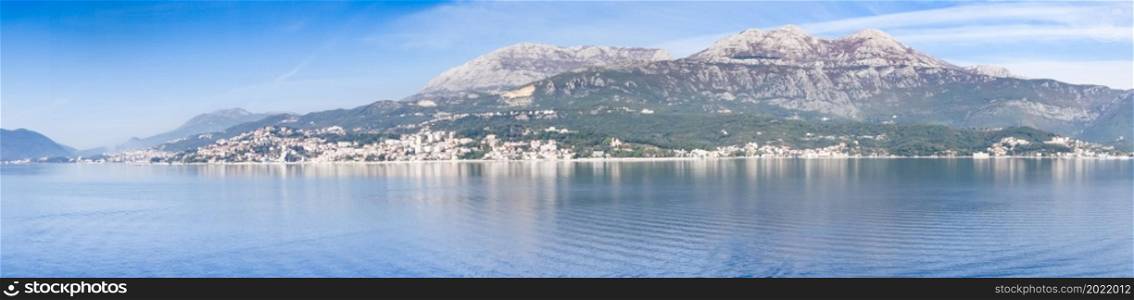 Panoramic view of Bay of Kotor from the sea surrounded by mountains in Montenegro, one of the most beautiful bay in the world.. Panoramic view of Bay of Kotor from the sea surrounded by mountains in Montenegro, one of the most beautiful bay in the world